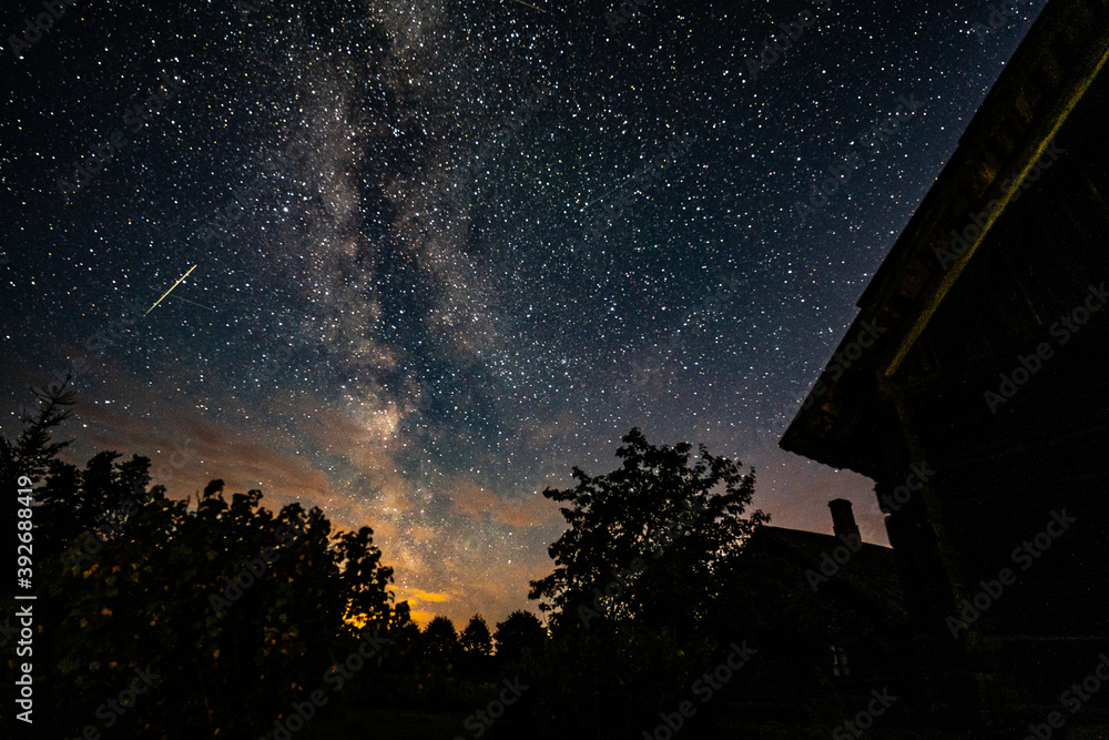 Wall mural overhead milky way with stars in clear summer night. country side.