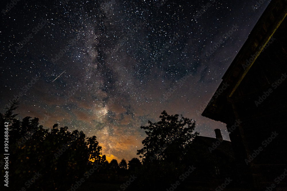 Wall mural overhead milky way with stars in clear summer night. country side.