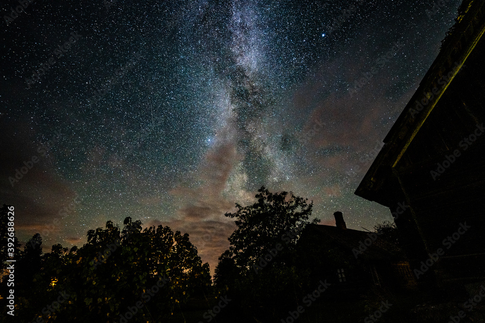 Wall mural overhead milky way with stars in clear summer night. country side.