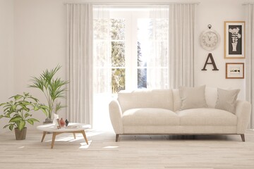 Fototapeta premium White living room with sofa and winter landscape in window. Scandinavian interior design. 3D illustration