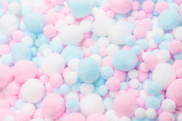 White, pink and blue soft pompons.