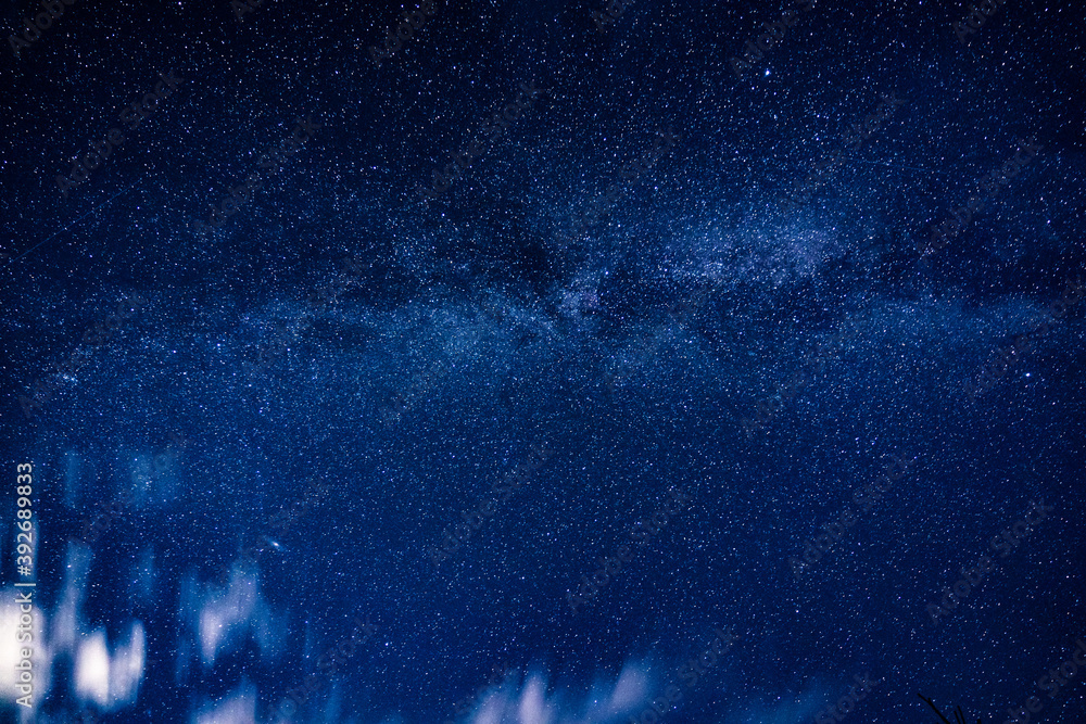Wall mural overhead milky way with stars in clear summer night. country side.