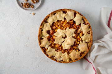 Shortcrust pastry pie with apple on white background, free space