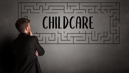 businessman drawing maze with CHILDCARE inscription, business education concept