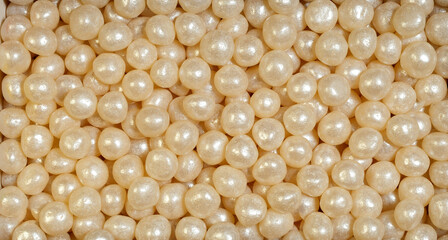 Round pearl candy for background.