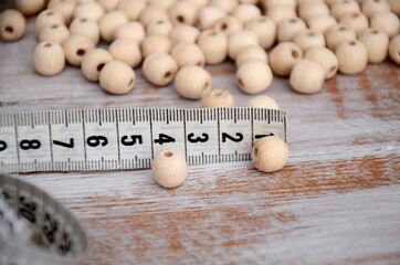 Small Unfinished natural wooden ball beads. Round wood beads and measurement. 
