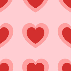 Seamless pattern of large isolated red hearts. The elements are evenly spaced. Vector illustration on light red background