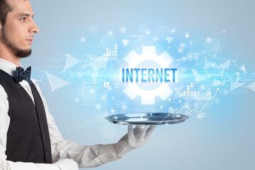 Waiter serving new technology concept with INTERNET inscription