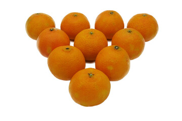 Bright juicy tangerines are laid out in the shape of a triangle on a white background.