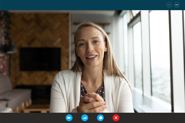 Computer application head shot display view smiling young blonde 30s woman talking looking at web camera, successful businesswoman holding online video call negotiations meeting with partners.