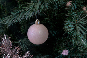 White Christmas’ decoration over green spurs background 