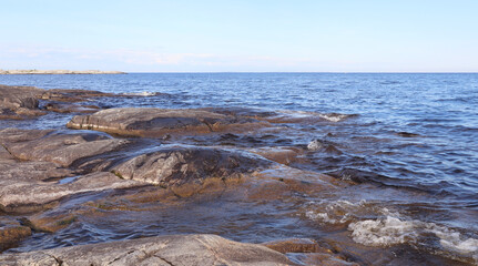 The tops of rock formations protruding from the water
