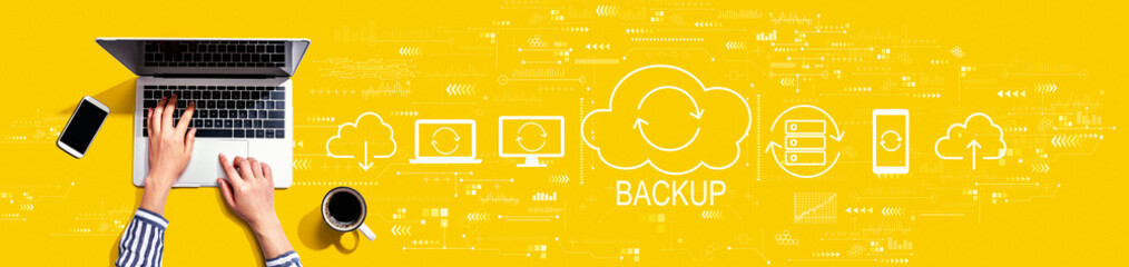Obraz na płótnie Canvas Backup concept with person using a laptop computer