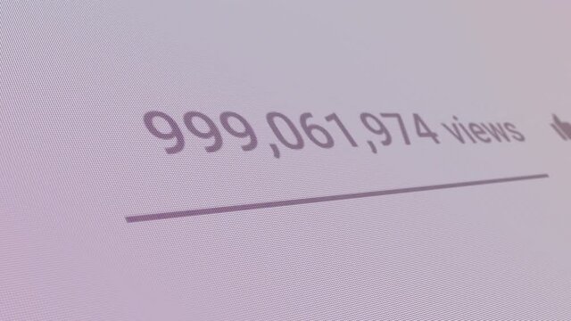 1 Billion Views 
Media Counter Increasing Monitor Screen Close Up