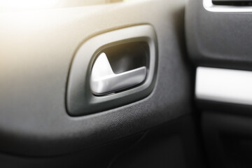 Close-up view of the car door handle.