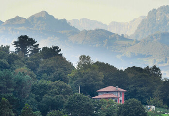 Sunrise amid mist in the towns of Picos de Europa