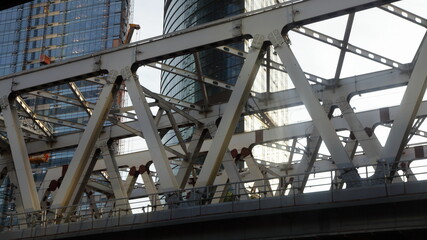 Railway metal bridge frame, Miscowindustrial architecture at summer day