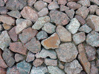 large red tan stone rocks pile group overhead view with deep shadows and bright details as backdrop background for website architecture presentation scenery