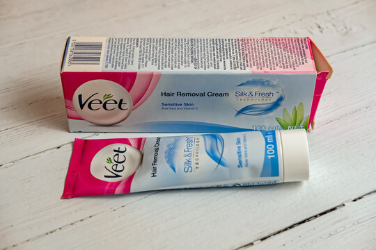 Norwich, Norfolk, UK &ndash; November 14 2020. Illustrative photo of a plastic tube of Veet hair removal cream on a white wooden top