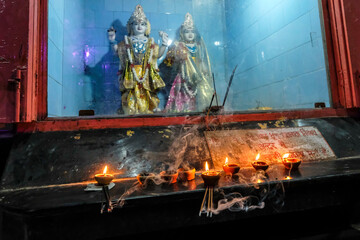 Tezpur, India - November 2020: Candles at the Ganesh Ghat temple on November 14, 2020 in Tezpur, Assam, India.