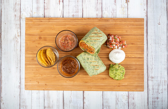 Mexican Food Veggie Burrito Top View Shot On A Wooden Table