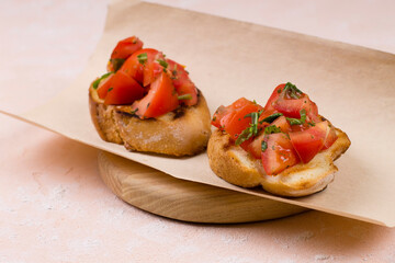 Fresh tomato bruschetta. Italian appetizer with basil and spices