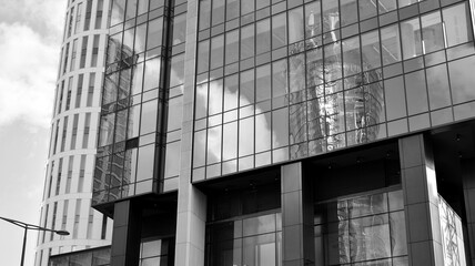 Abstract modern architecture with high contrast black and white tone. Architecture of geometry at glass window - monochrome. Black and white.