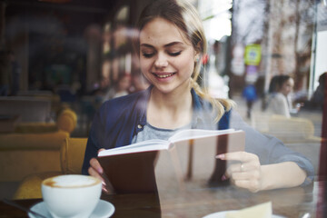 Woman reading book cafe vacation lifestyle Cup of coffee in the morning