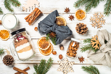 Eco friendly and zero waste Xmas presents wrapped in clothes with natural materials.