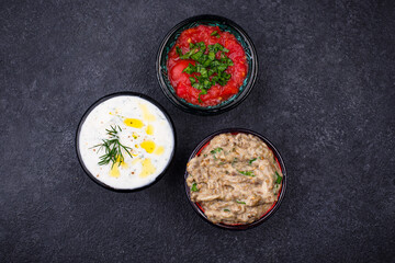 Baba ganoush, tzatziki and tomato ezme