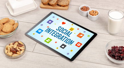 Healthy Tablet Pc compostion with SOCIAL INTEGRATION inscription, Social networking concept