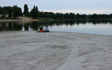 Two women on an empty beach

