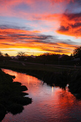 Obraz premium sunset over the river