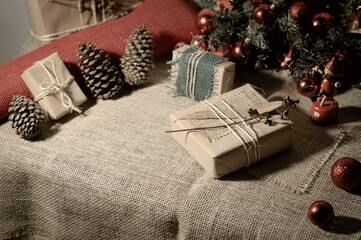 gifts, boxes and ornaments in an artistic Christmas setting
