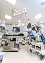 Medical devices. Interior hospital design concept. Operating room in modern clinic. Monitor is turned on.