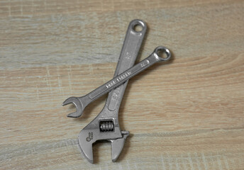 Wrenches on the wooden table