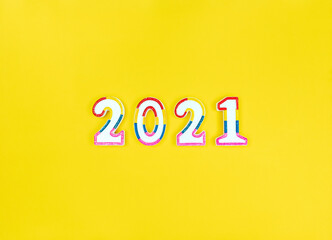 New year 2021 figures on a yellow background.