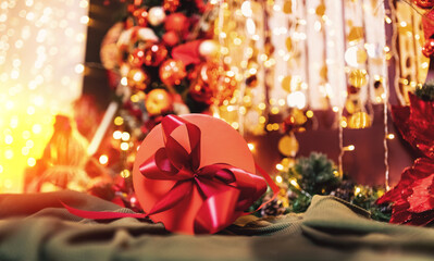 Beautiful banner red Christmas gift boxes on background bokeh blur lights and illumination