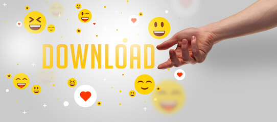 Close-Up of cropped hand pointing at DOWNLOAD inscription, social media concept