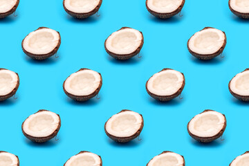 Half a coconut on blue background. Seamless pattern.