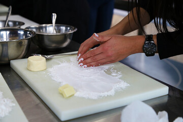 making curd cheese cakes in the kitchen