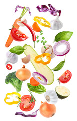 Set of different fresh vegetables and spices falling on white background