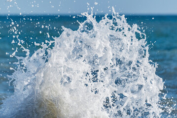 Wave of the sea water at sunny day time.