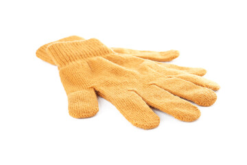 Yellow woolen gloves on white background. Winter clothes