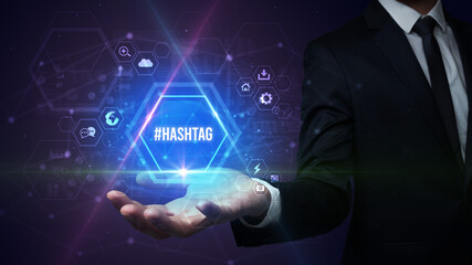 Man hand holding #HASHTAG inscription, social media concept
