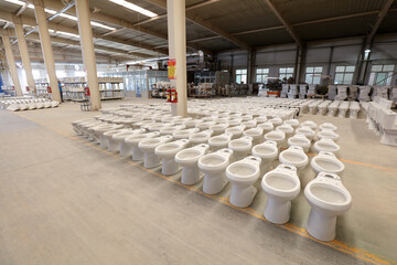 Semi-finished ceramic toilets are in the factory