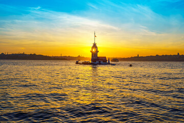 Maiden's tower and city panorama at sunset time - Istanbul, Turkey
