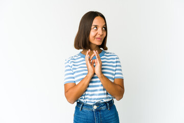 Young mixed race woman making up plan in mind, setting up an idea.