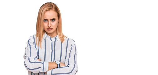 Beautiful caucasian woman wearing casual clothes skeptic and nervous, disapproving expression on...