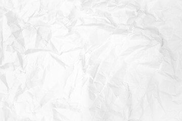 white and gray crumpled paper texture background. crush paper so that it becomes creased and wrinkled.